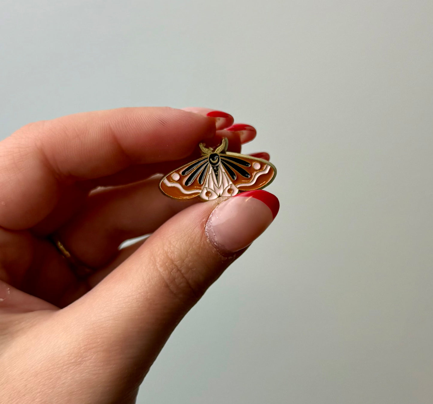 Brown moth enamel pin