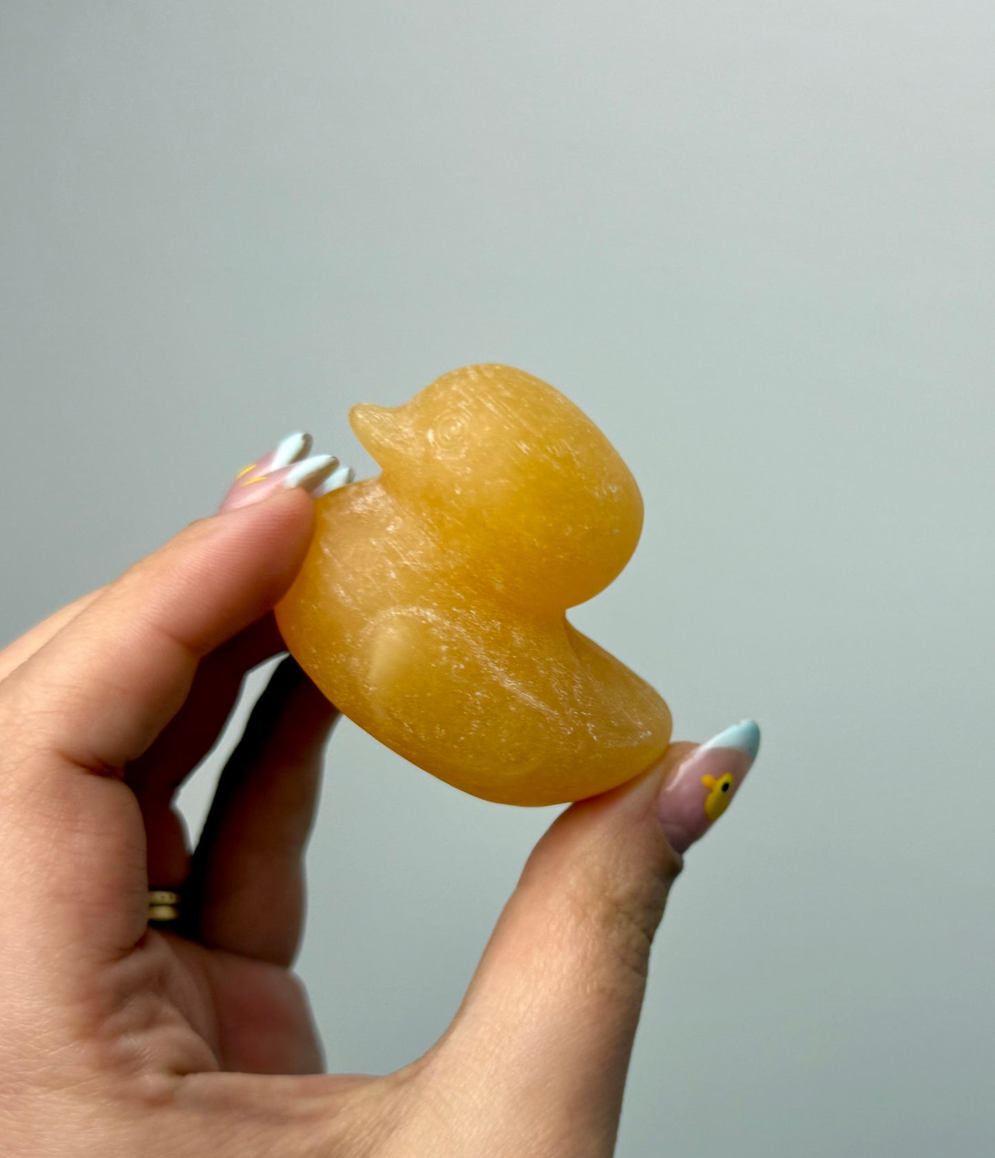 Orange calcite duck carvings