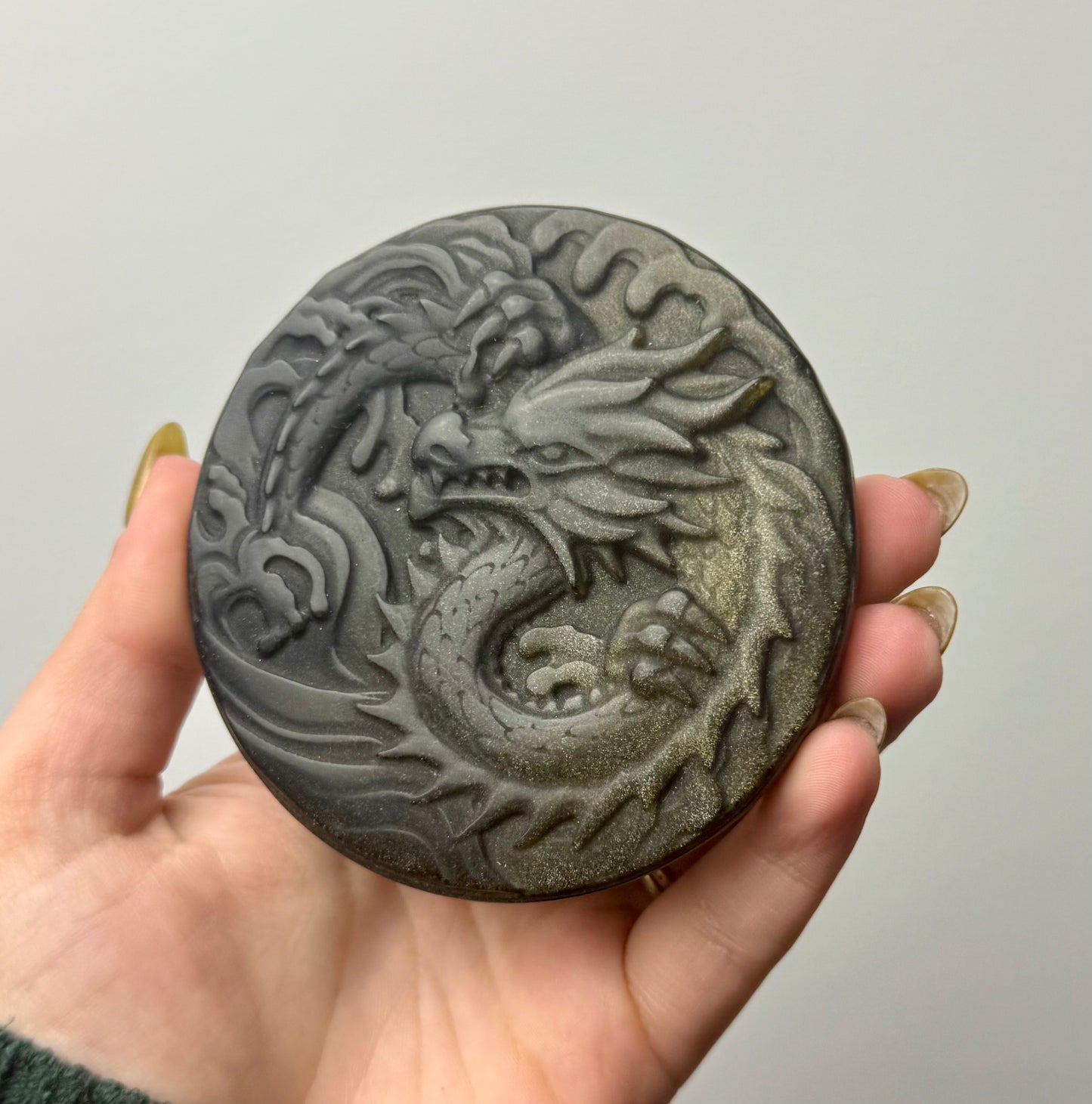 Gold sheen obsidian dragon carving