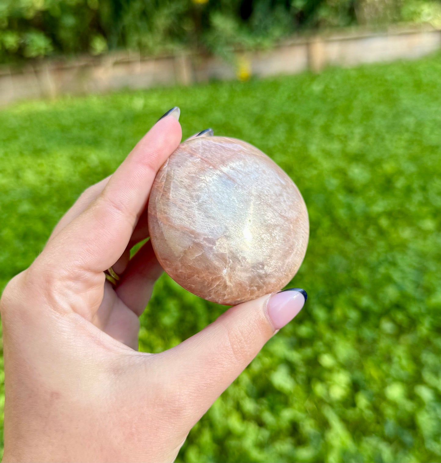 Peach moonstone palm stone