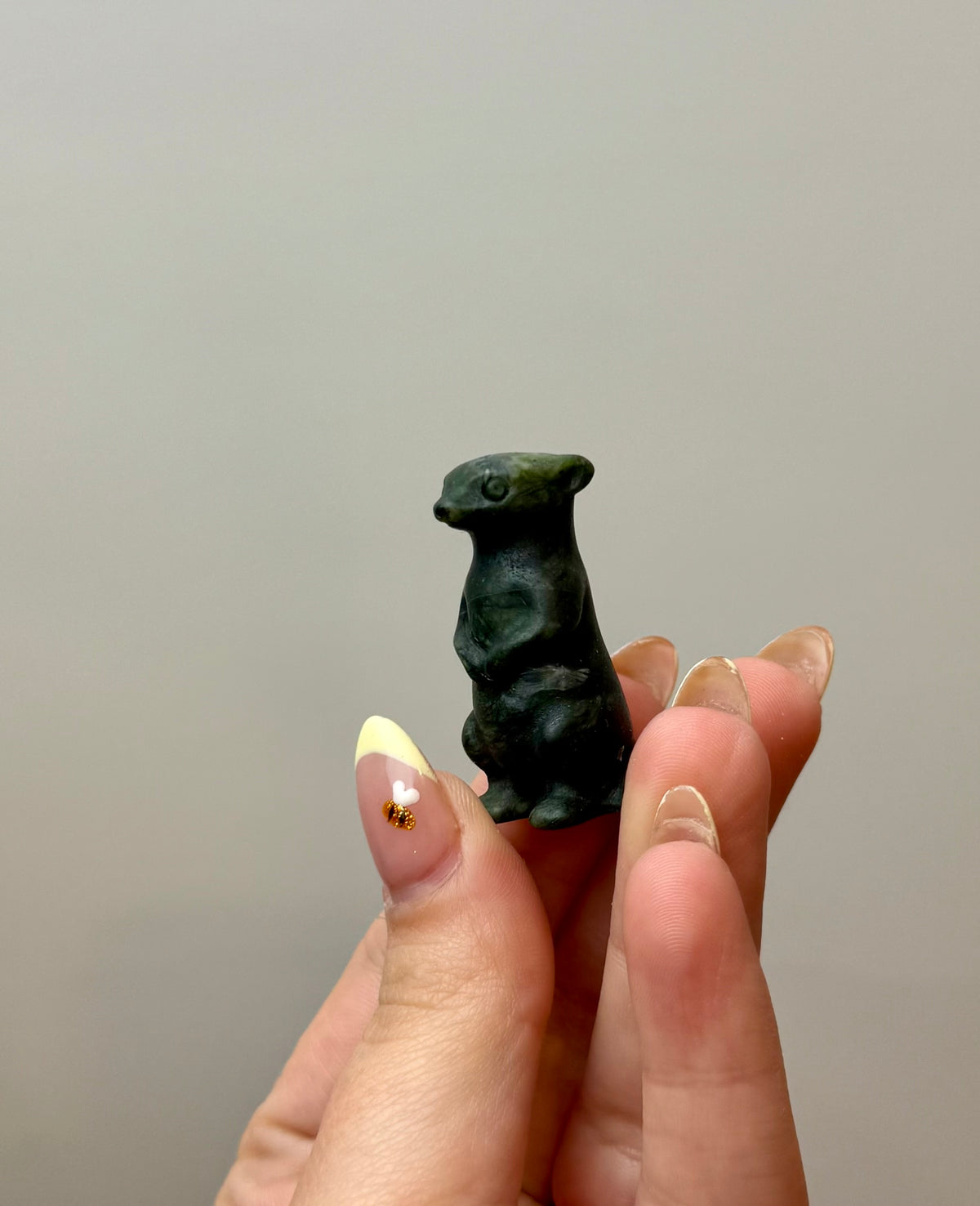 Jade meerkat carving