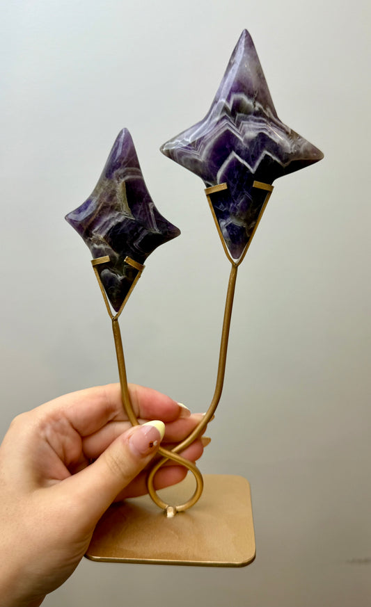 Dream amethyst shooting star carving on a stand