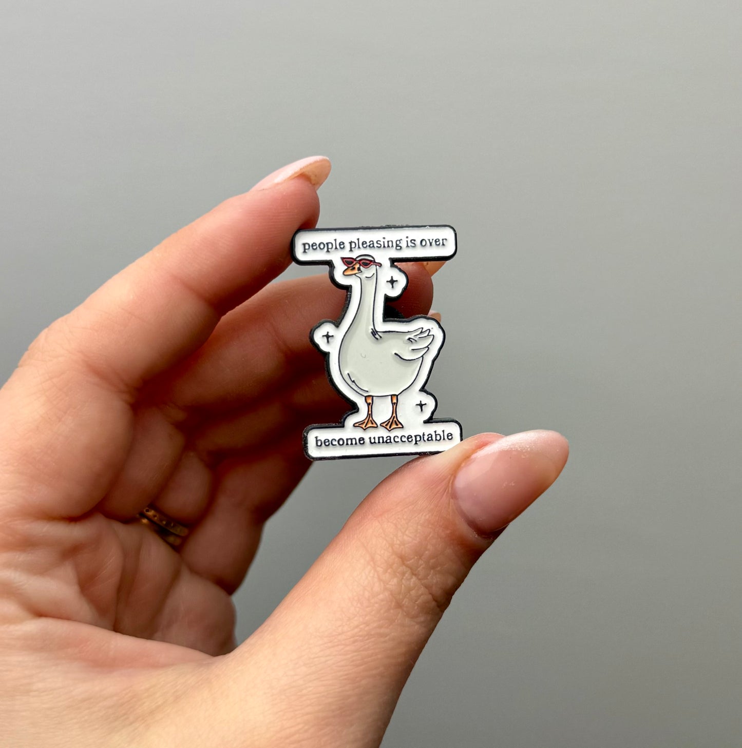 Goose people pleasing enamel pin