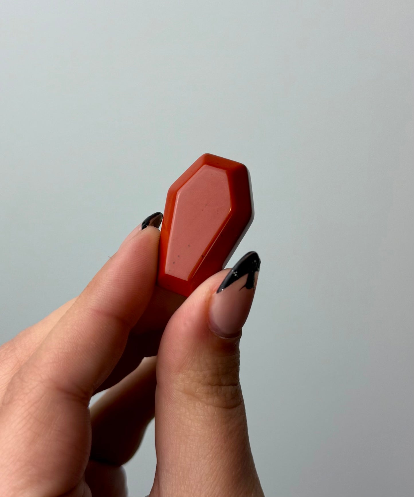 Red jasper coffin carving