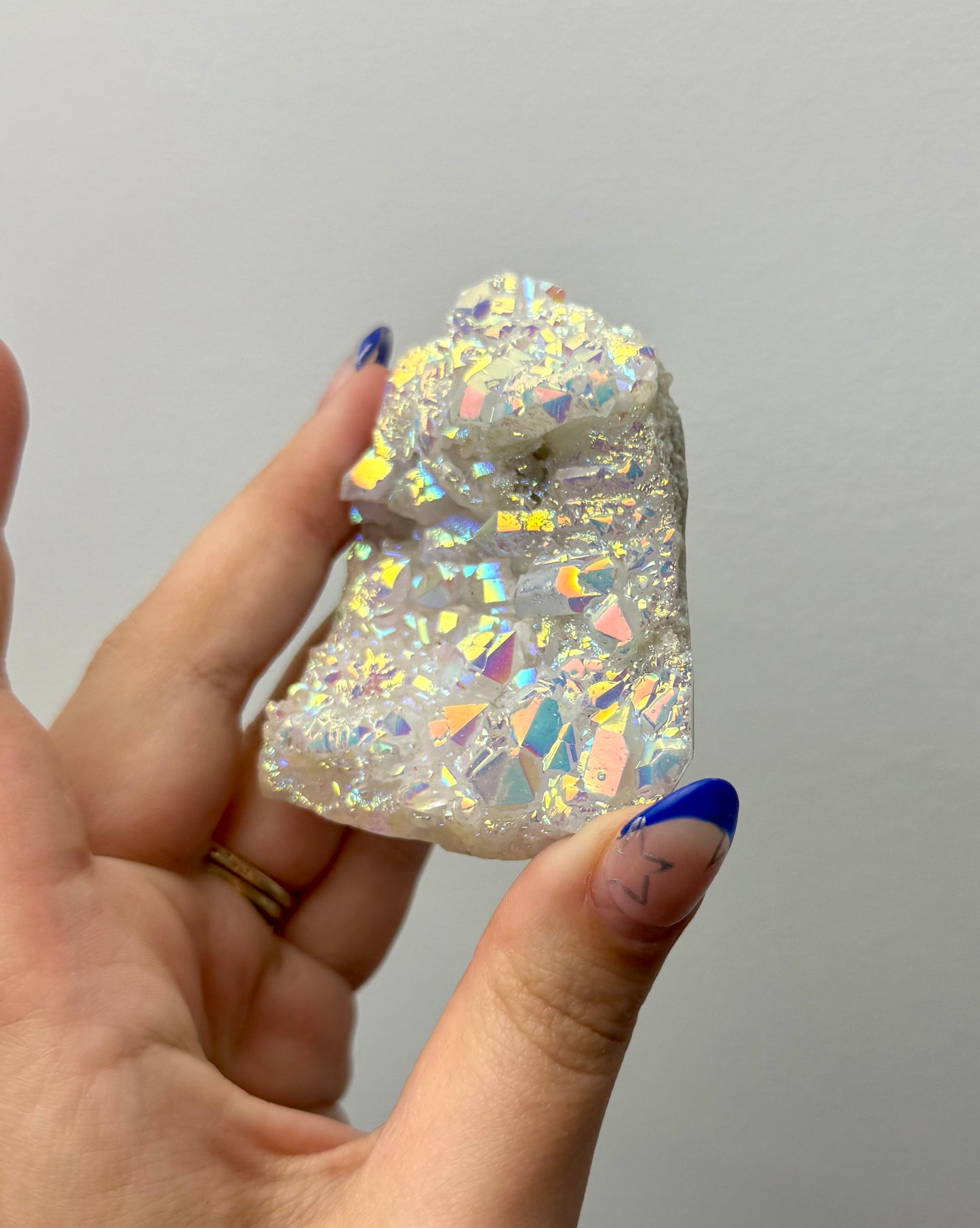 Altered aura quartz cluster