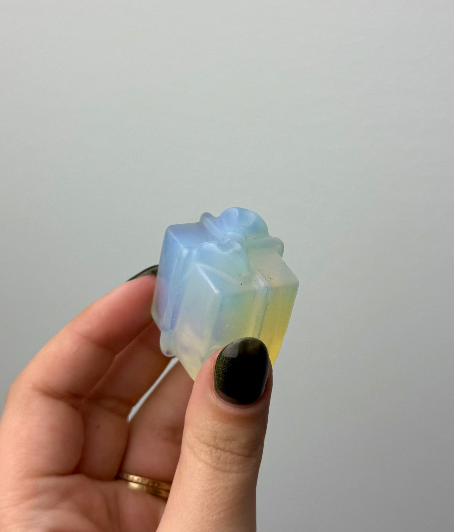 Man made material Opalite present carving