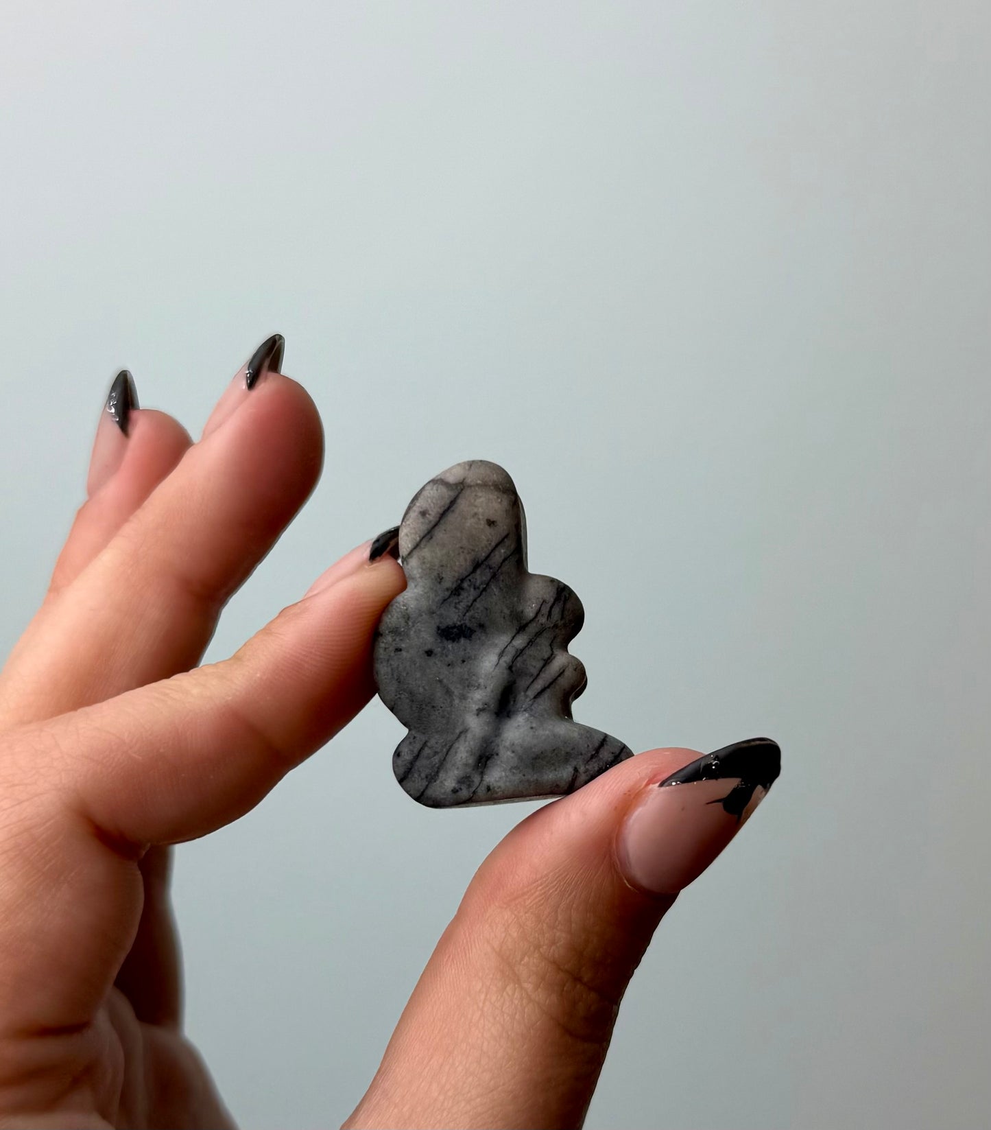 Spiderweb jasper fairy carving