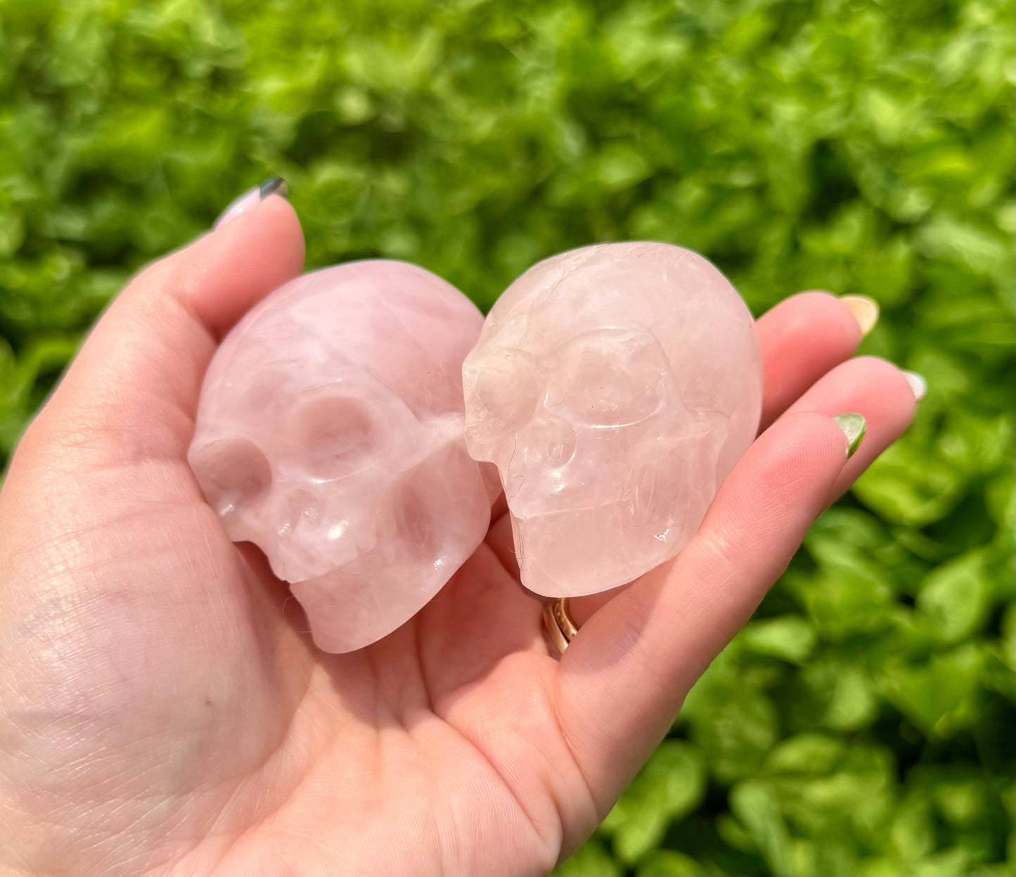 Rose quartz skull carvings