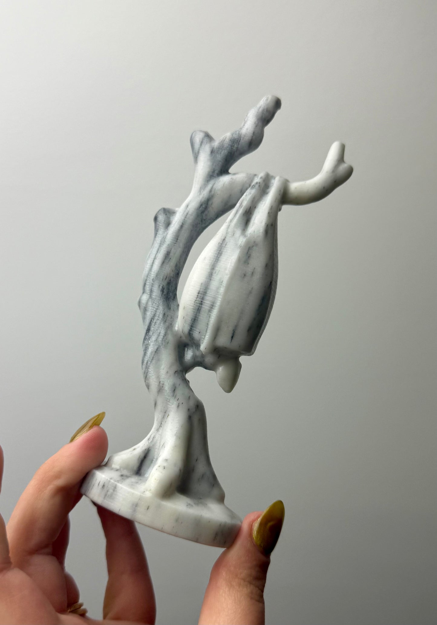 Taji jade bat carving