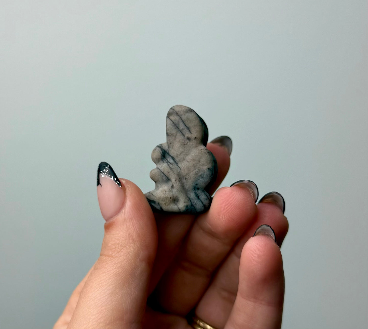Spiderweb jasper fairy carving