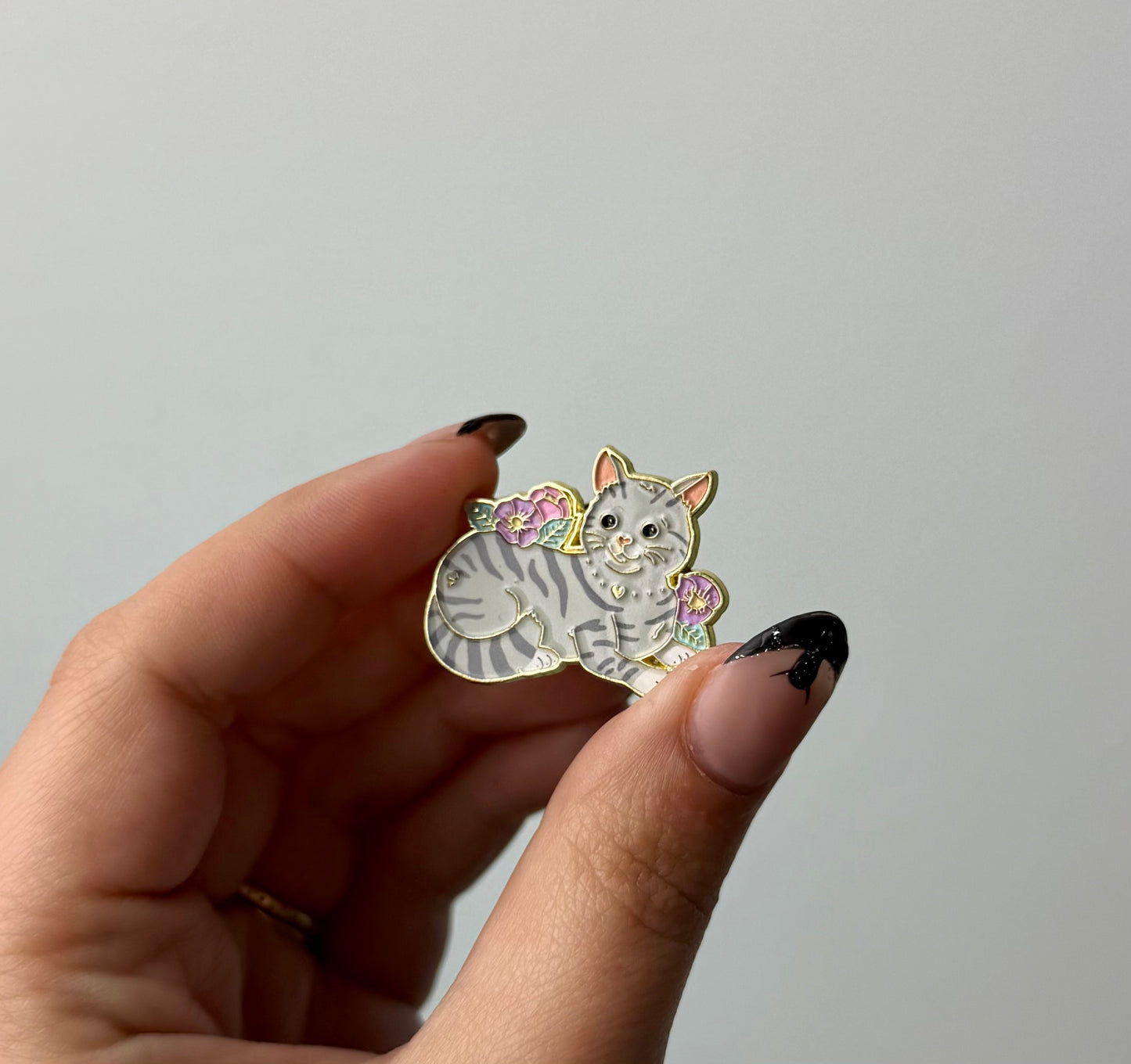 Grey cat enamel pin