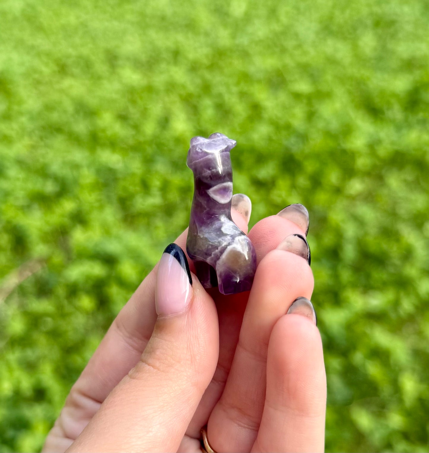 Amethyst giraffe carving