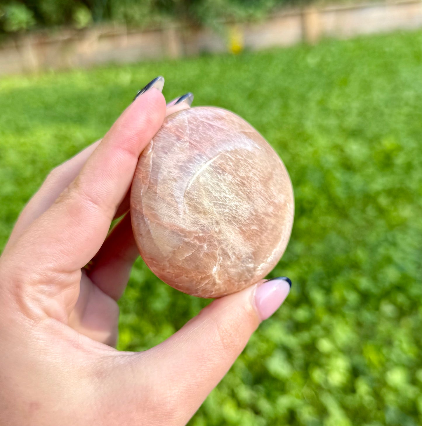 Peach moonstone palm stone