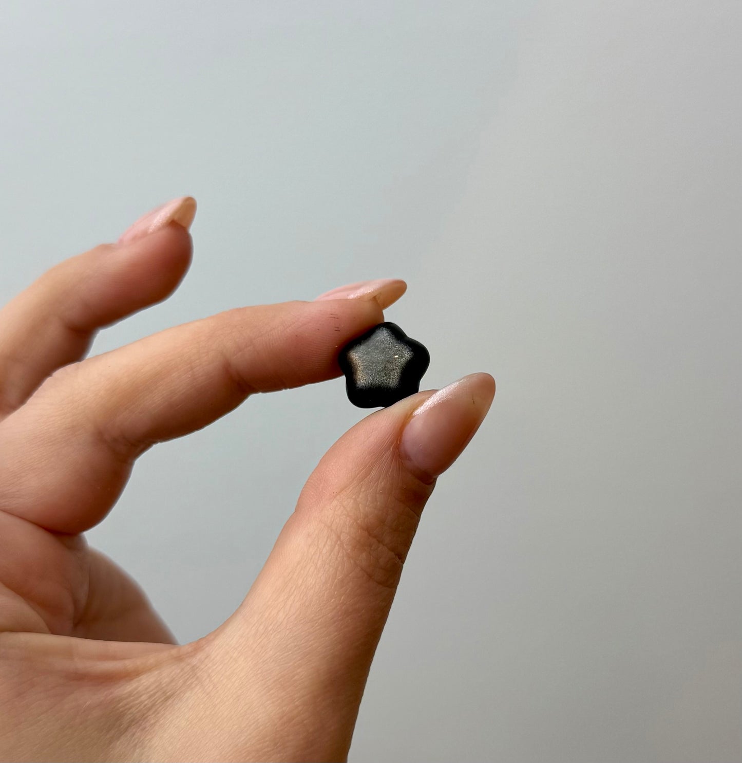 Silver obsidian puffy star carvings