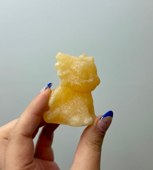 Orange calcite dragon carving