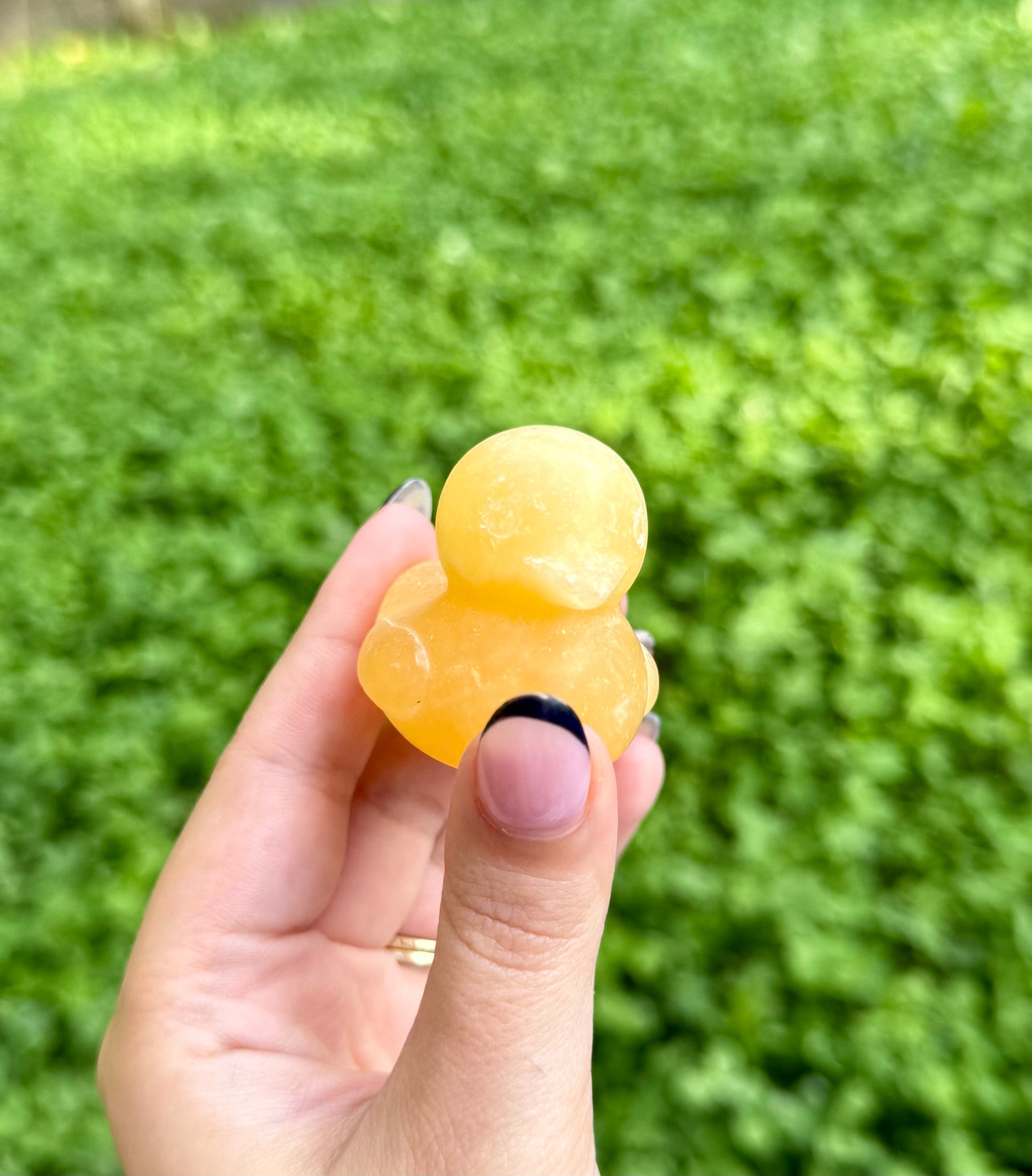 Orange calcite duck carving