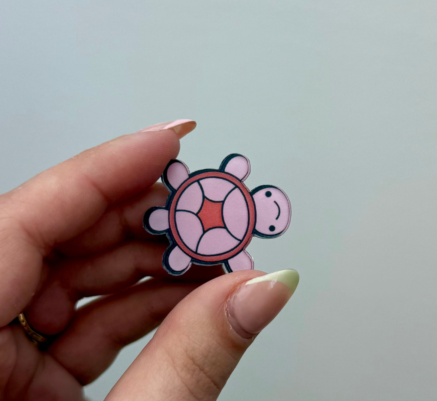 Pink turtle pin