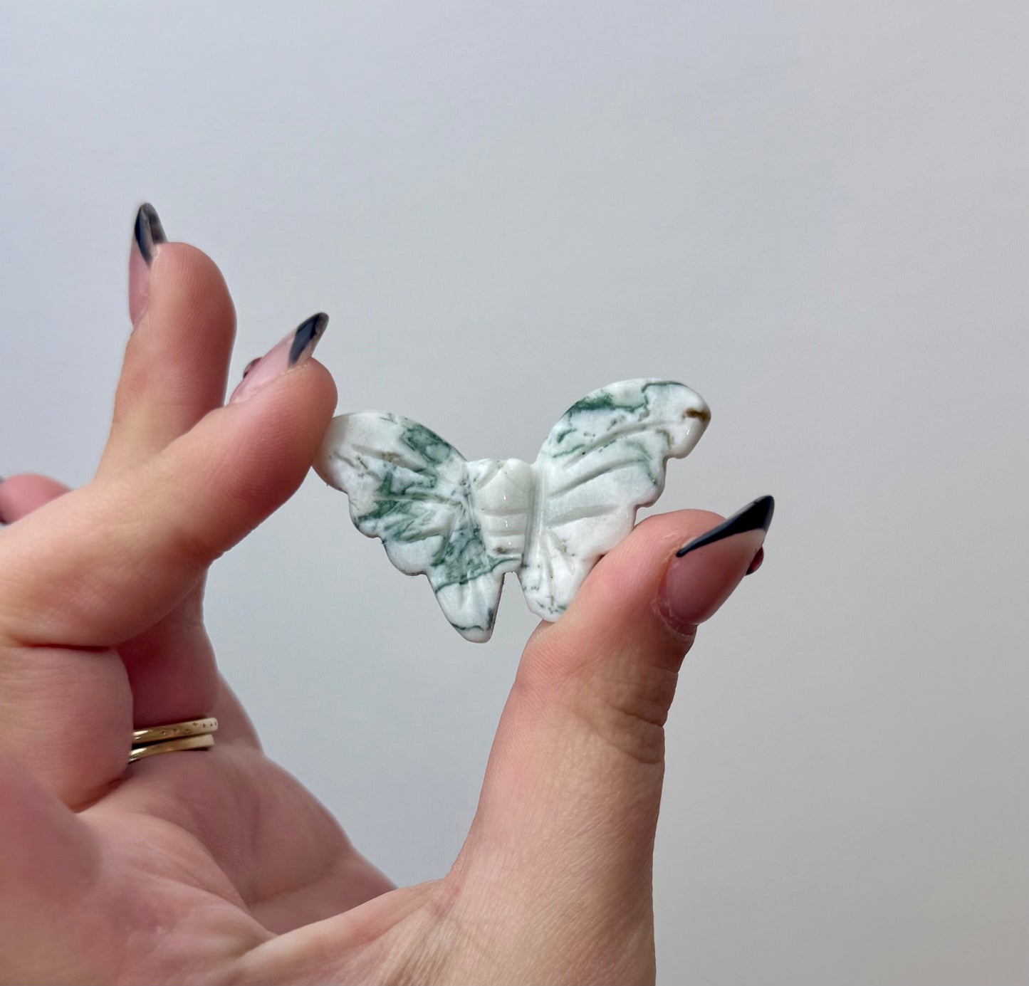 Moss agate butterfly carving