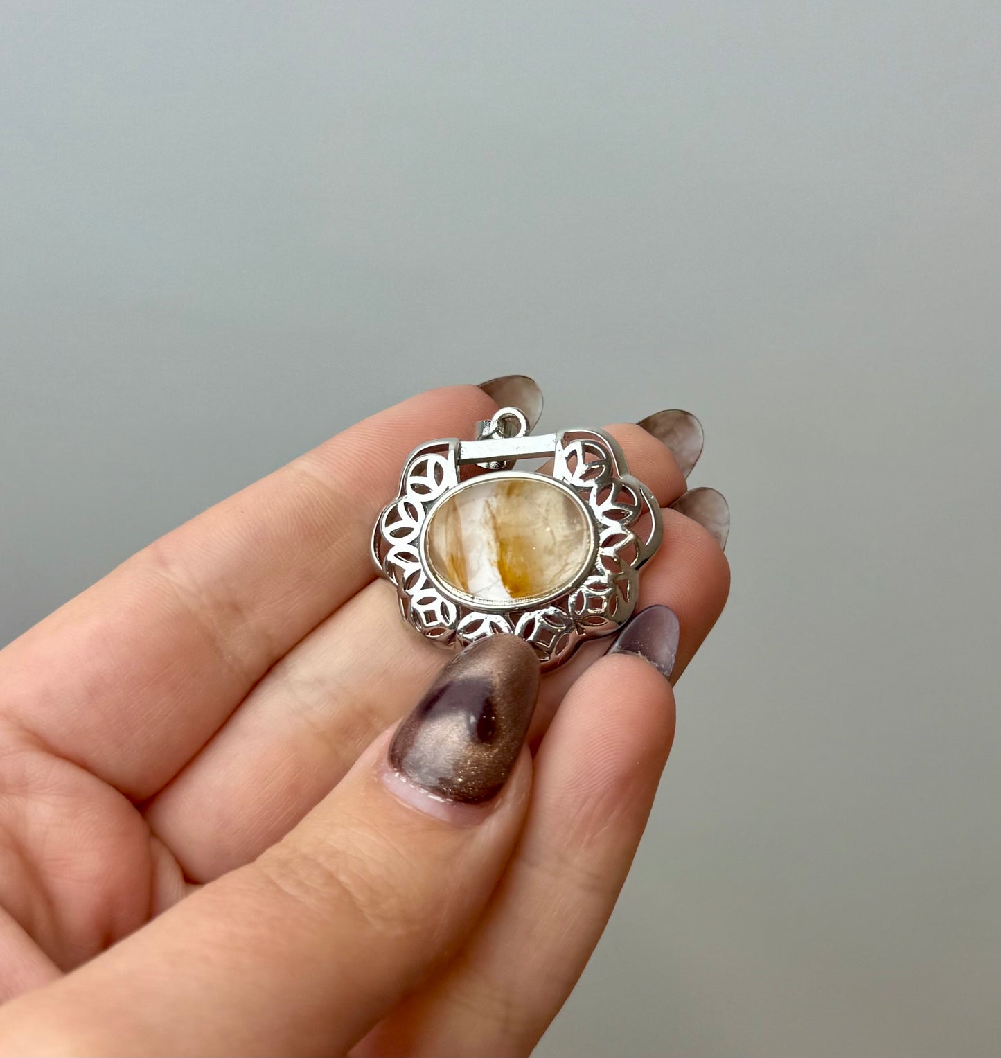 Golden healer pendant