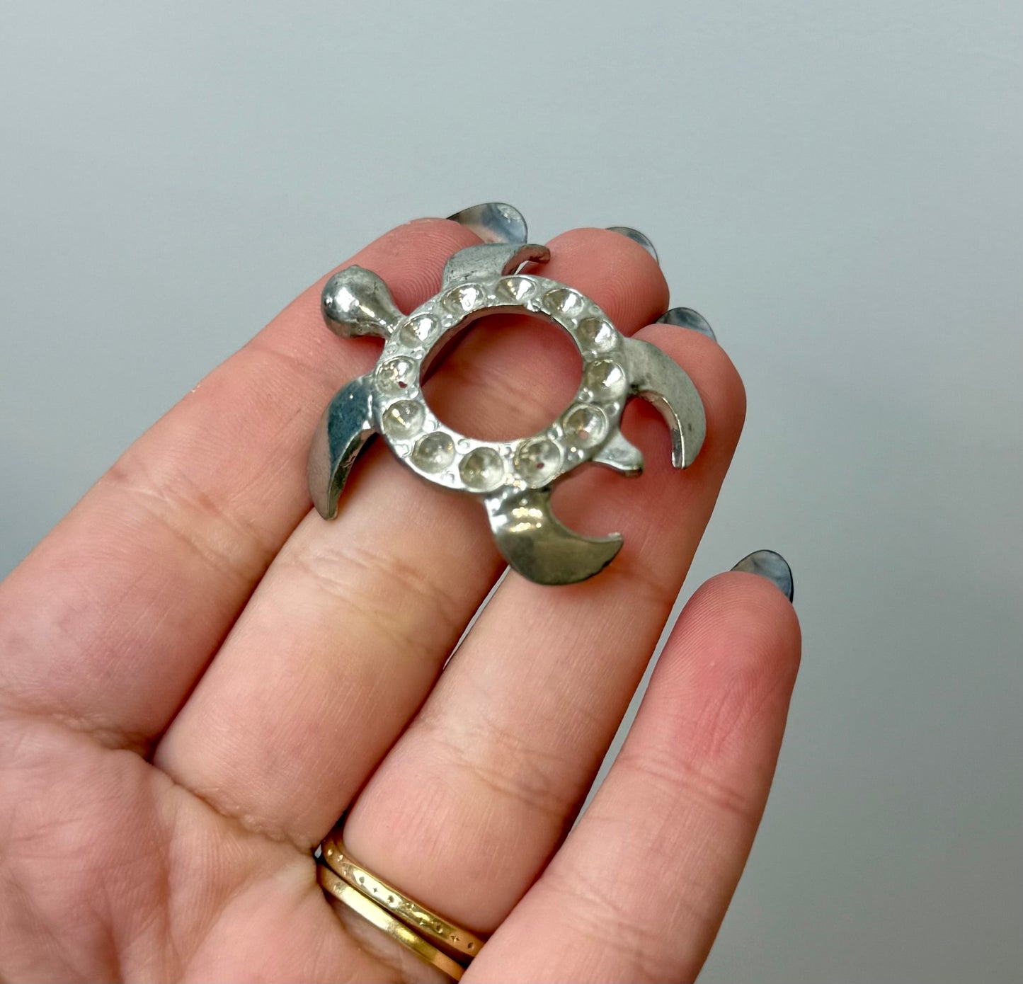 Silver turtle sphere stand