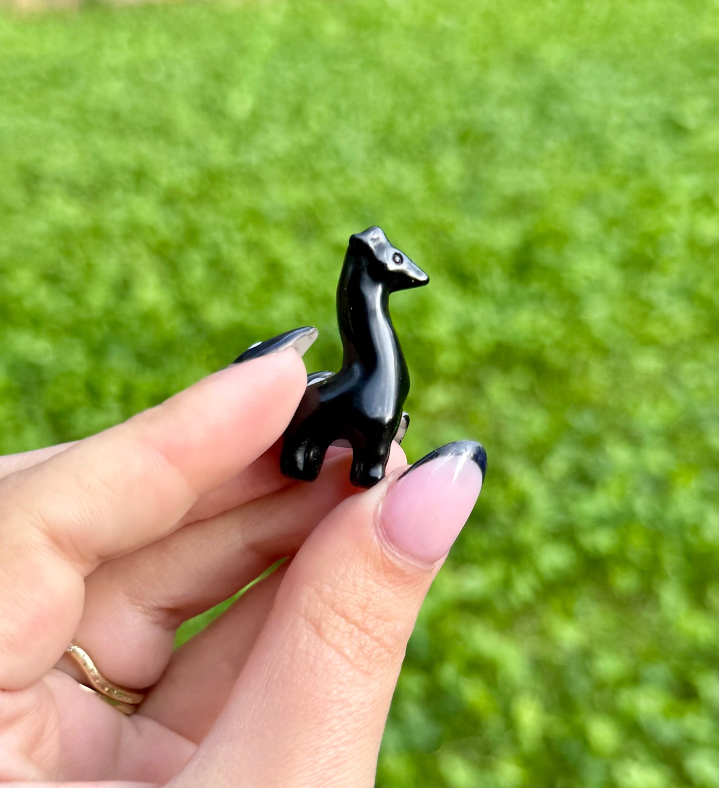 Obsidian giraffe carving