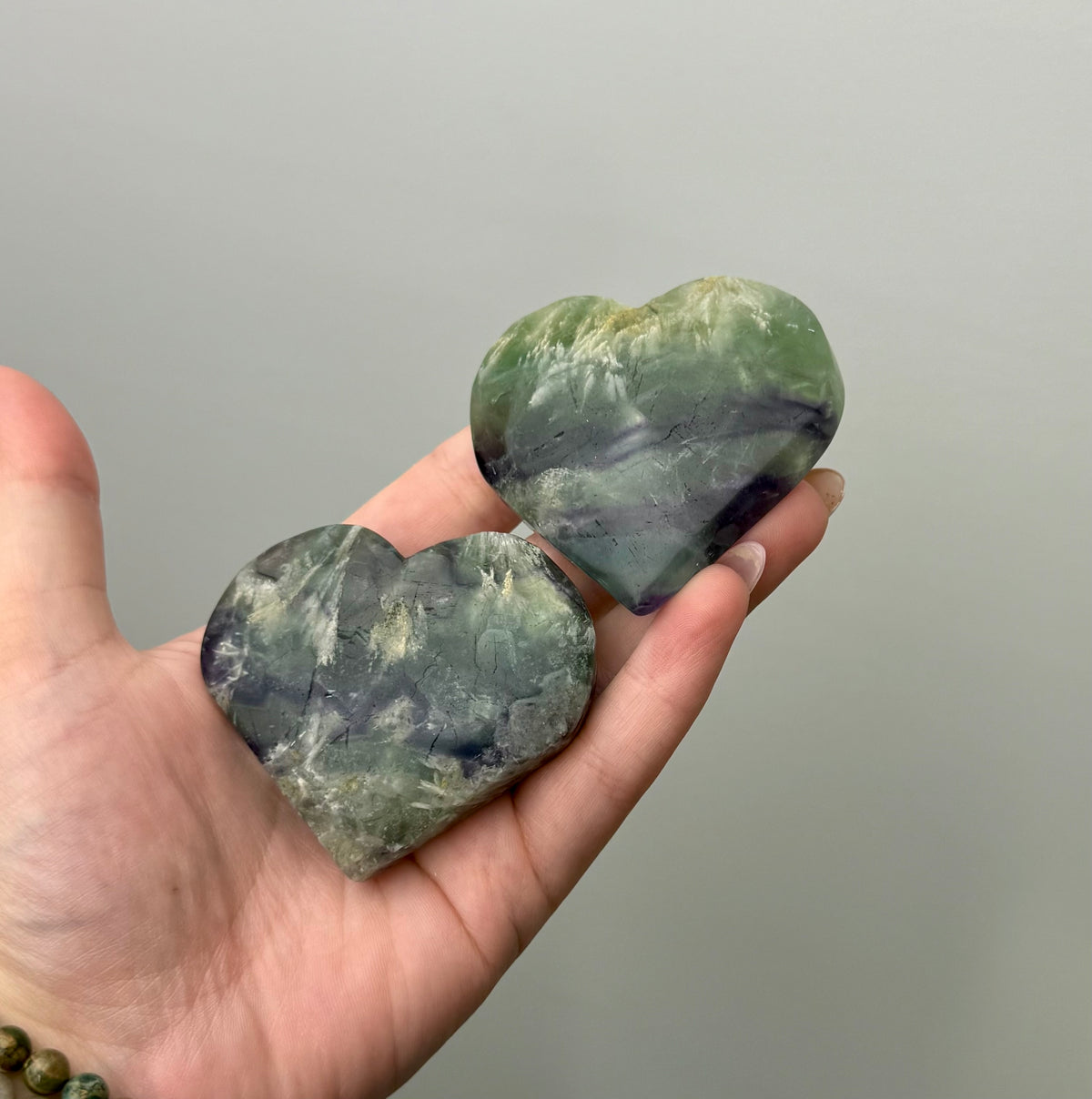 Feather fluorite heart carvings