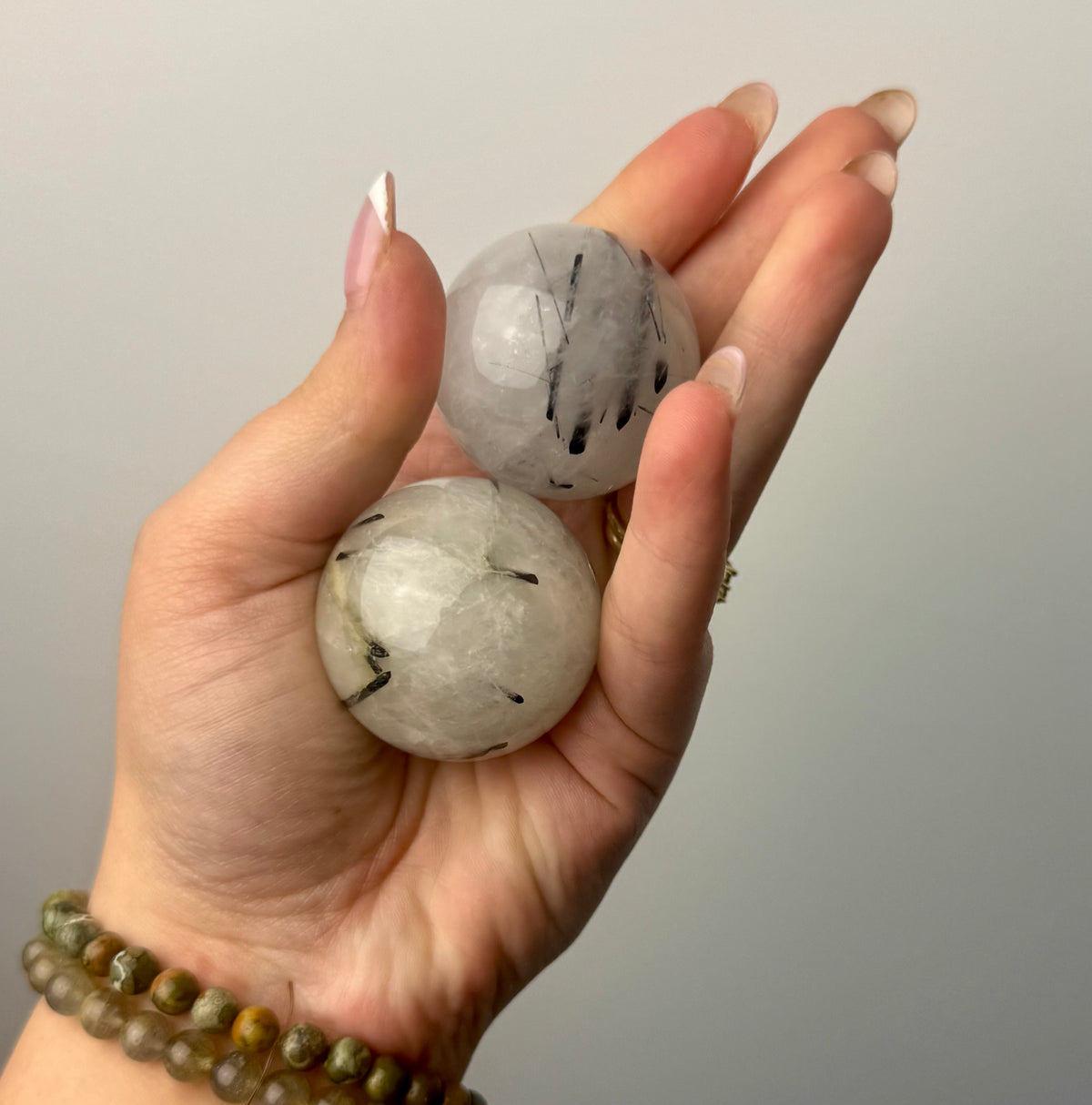 Black tourmaline in quartz spheres