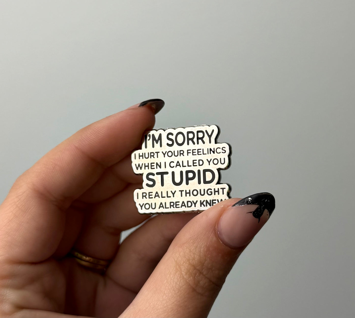 Stupid enamel pin