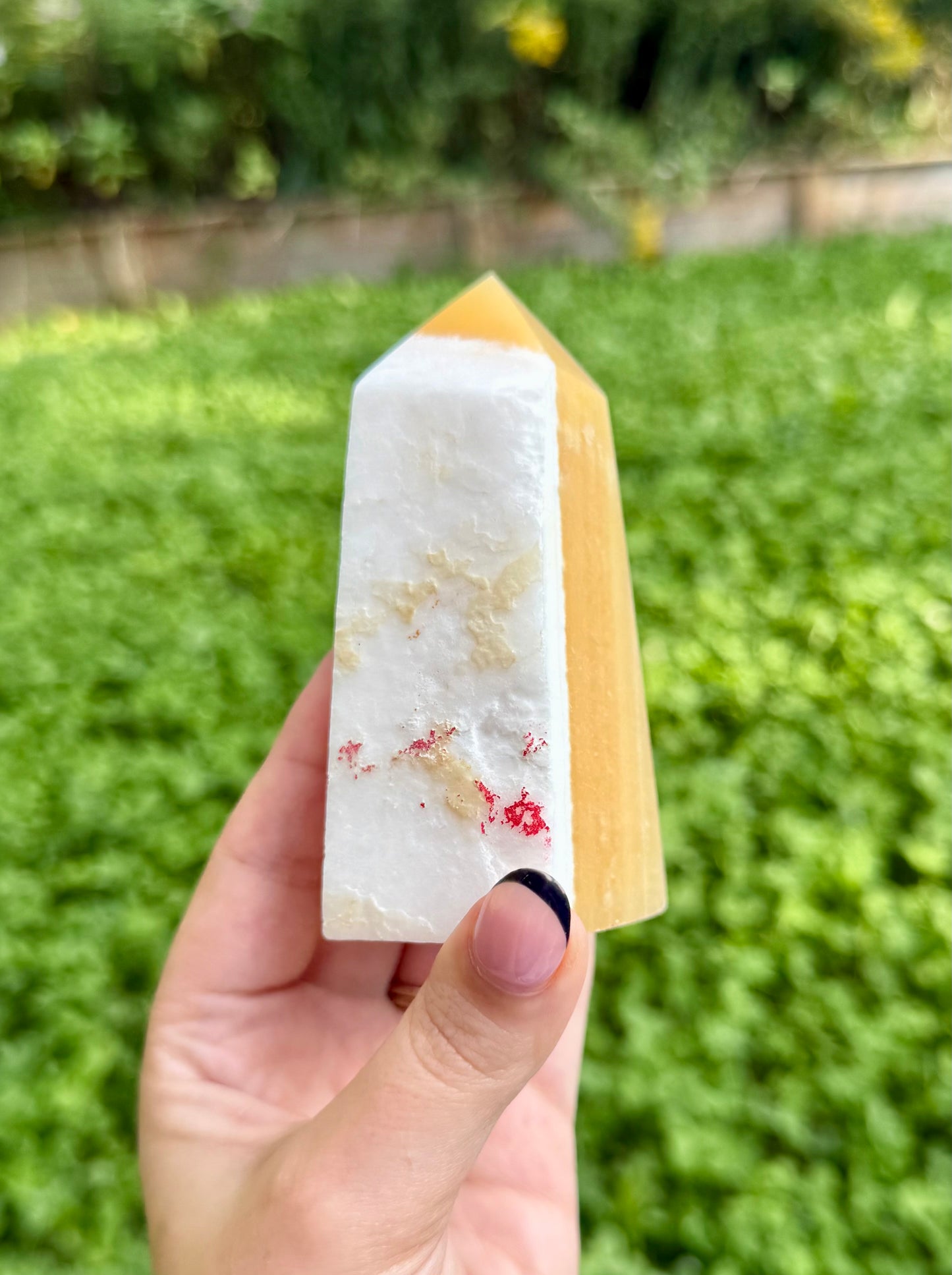 Imperfect orange calcite tower