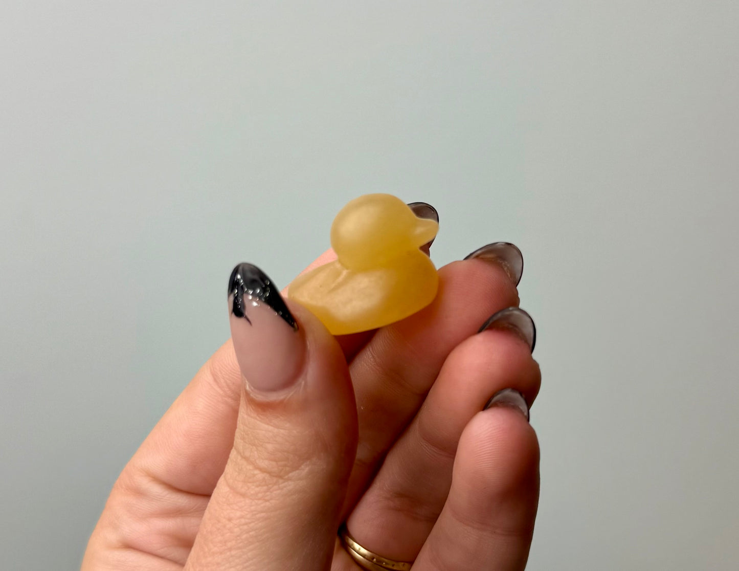 Orange calcite duck carving