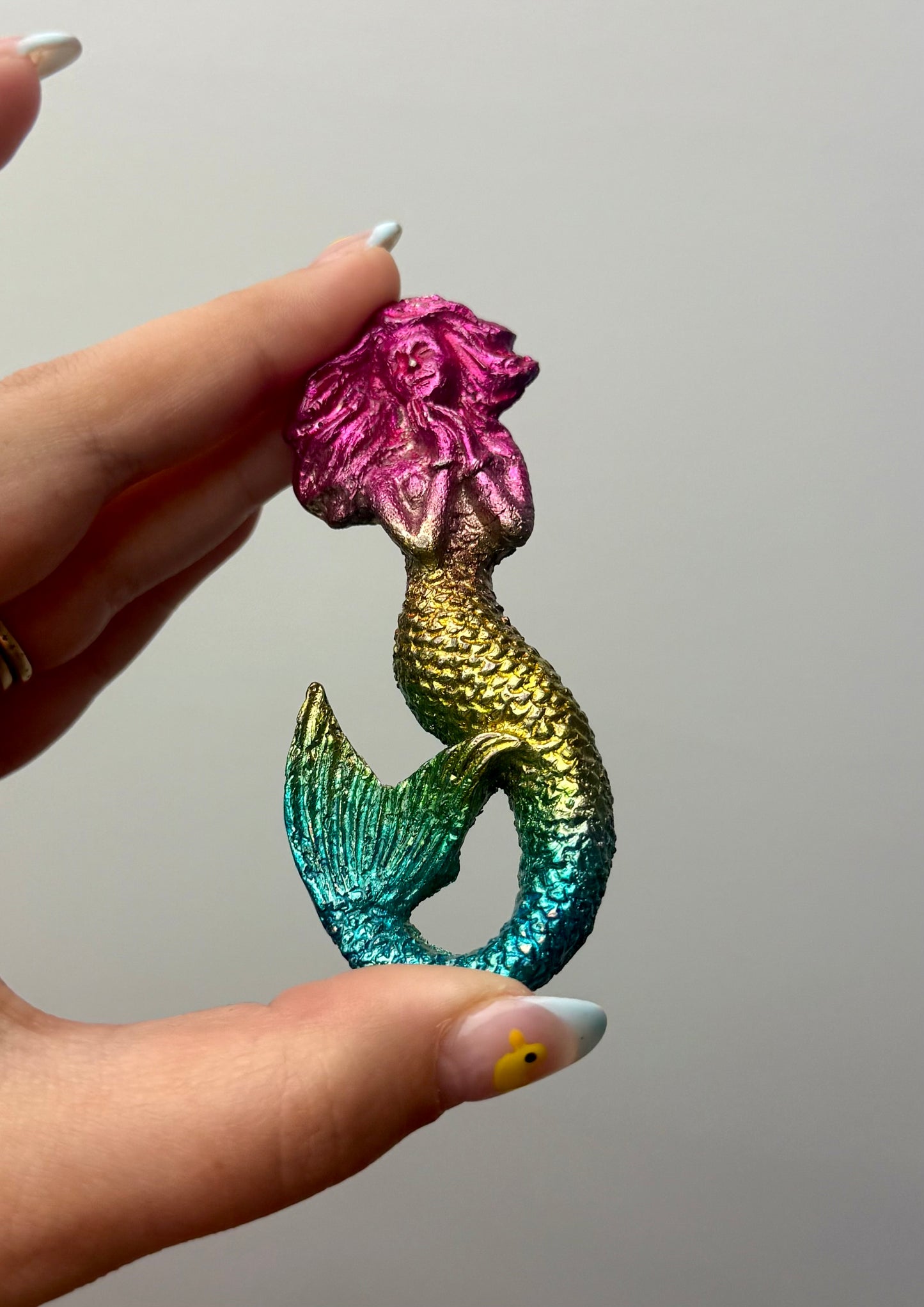 Bismuth mermaid carving