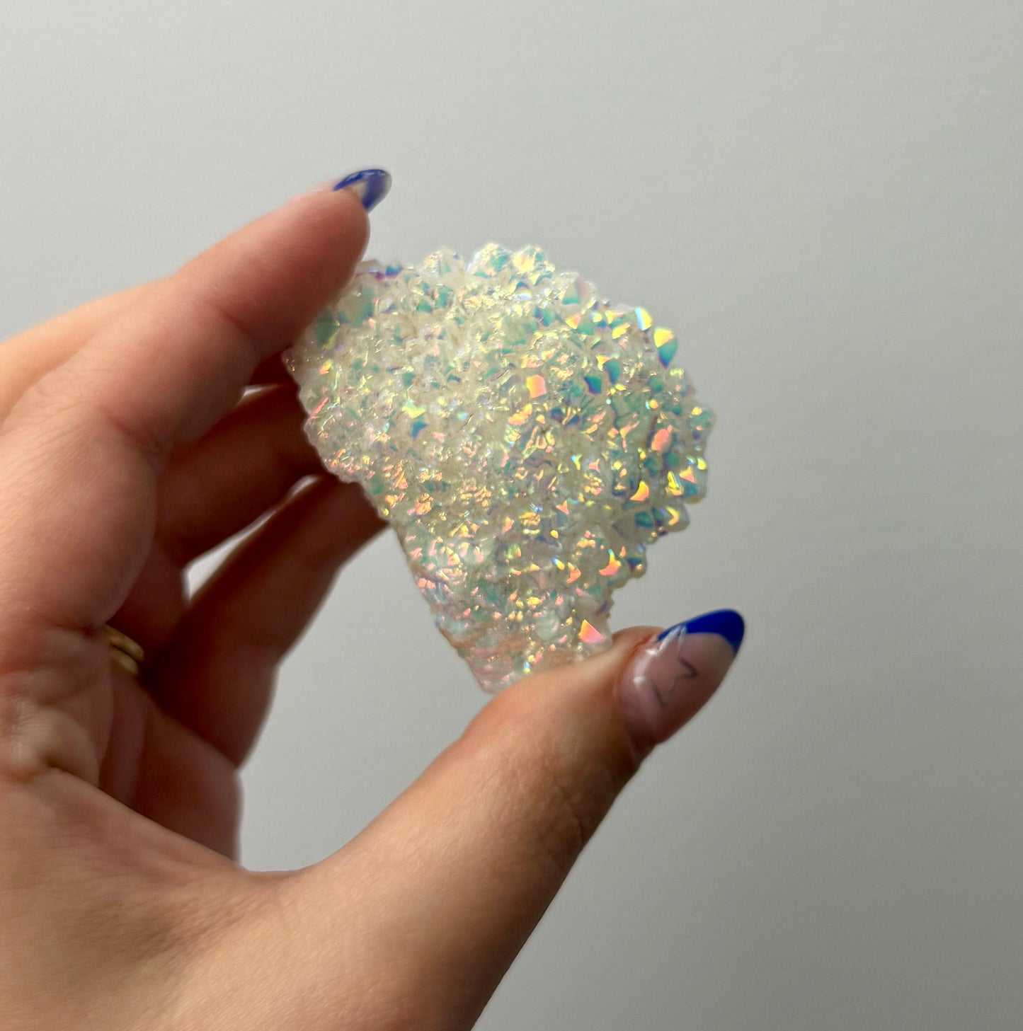 Altered aura quartz cluster