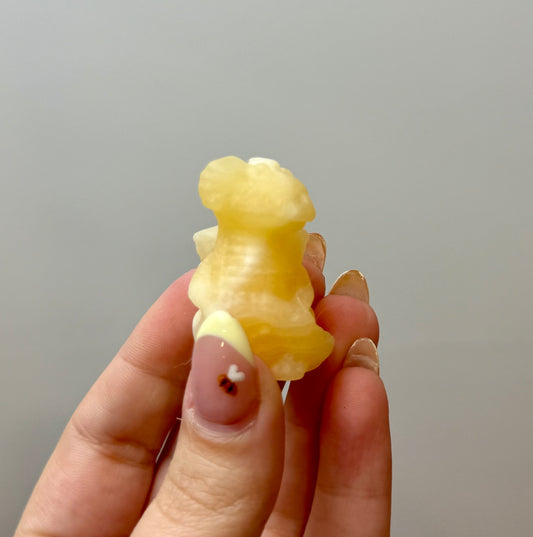 Orange calcite dragon carving