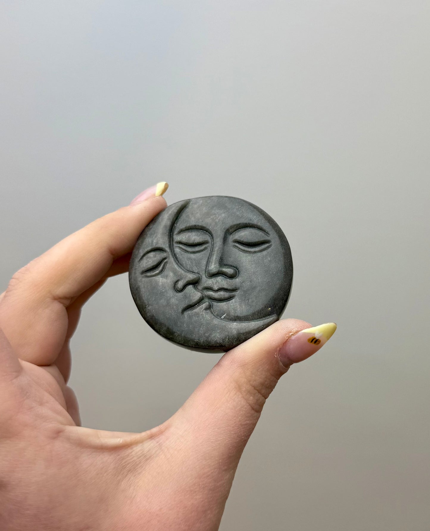 Sun and moon carving