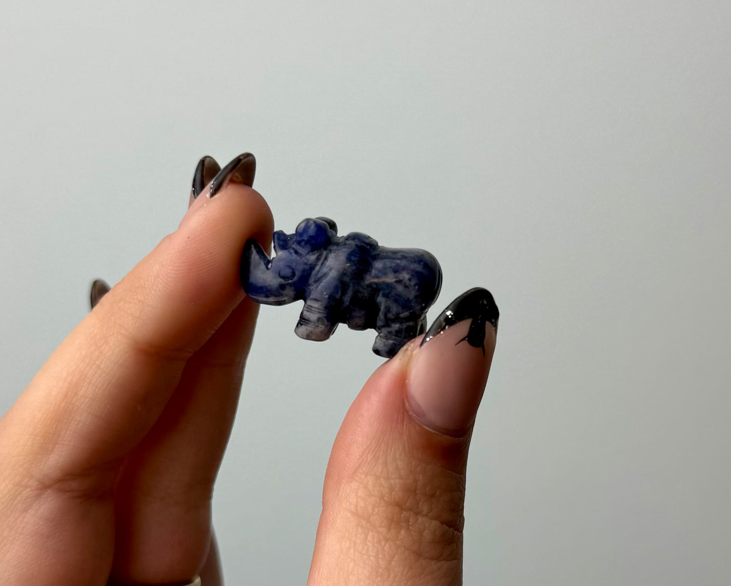 Sodalite rhinoceros carving 