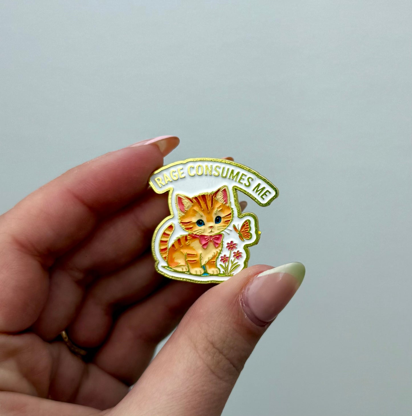 Rage cat enamel pin