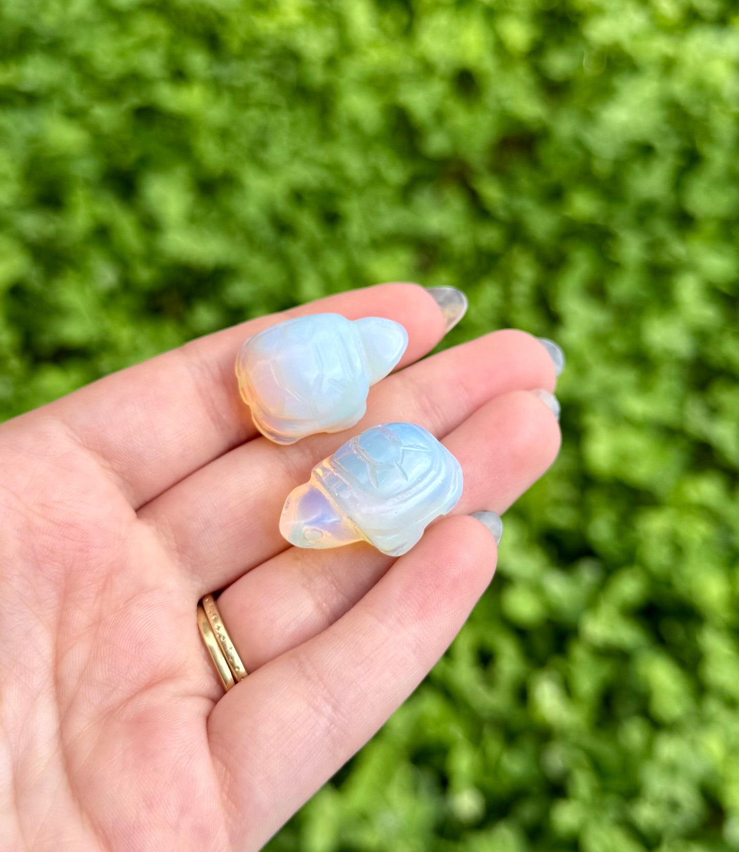 Man made material Opalite turtle carvings