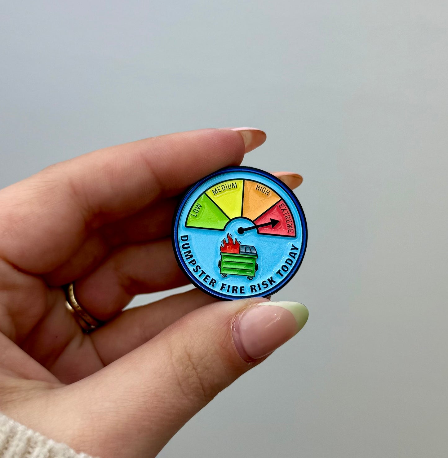Dumpster fire enamel pin