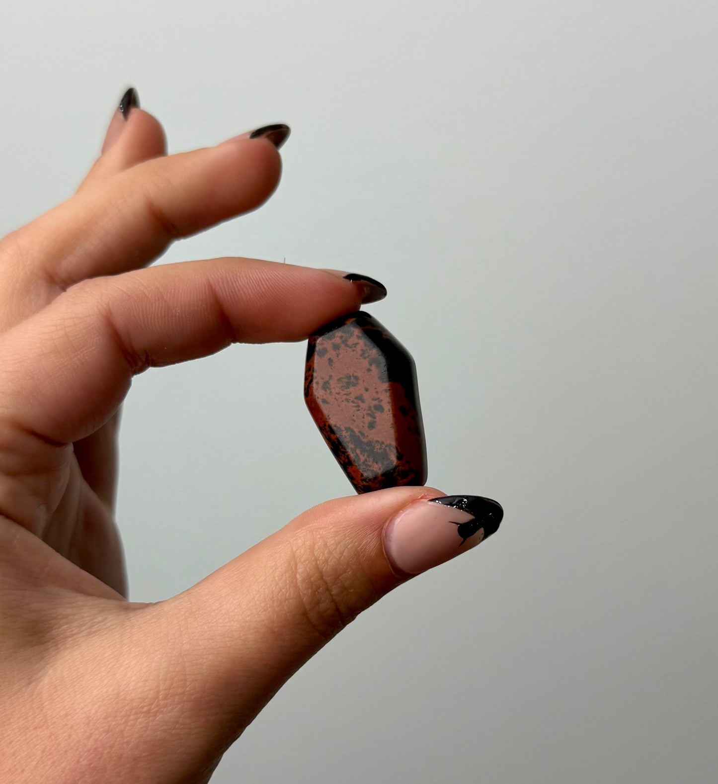 Mahogany Obsidian coffin carving