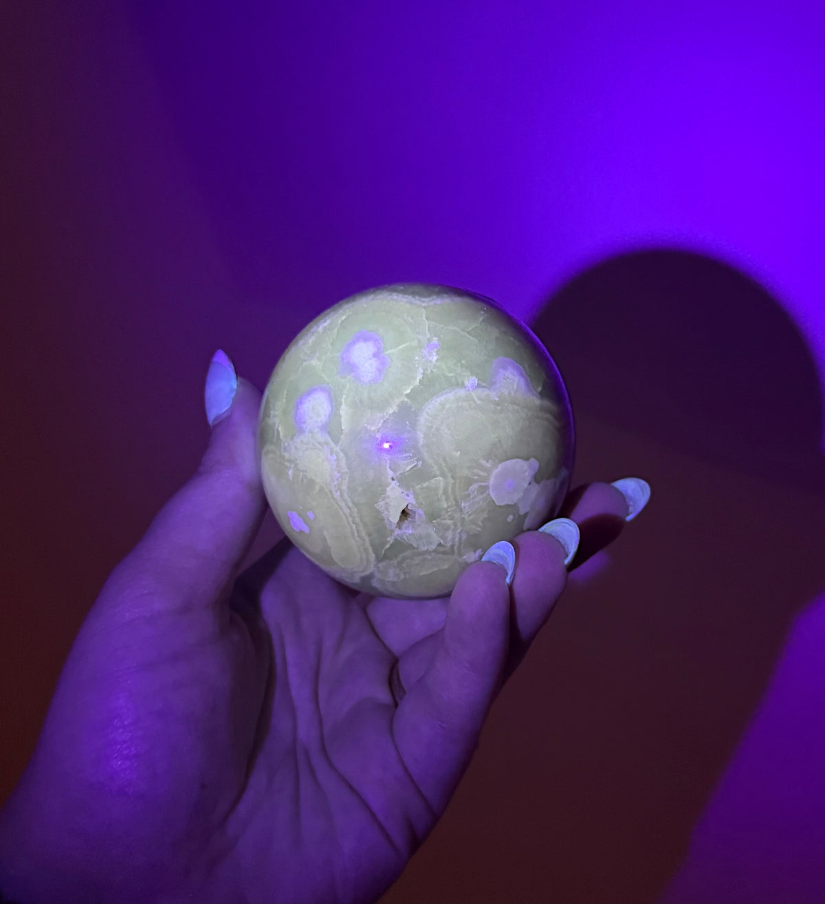 Amber calcite sphere