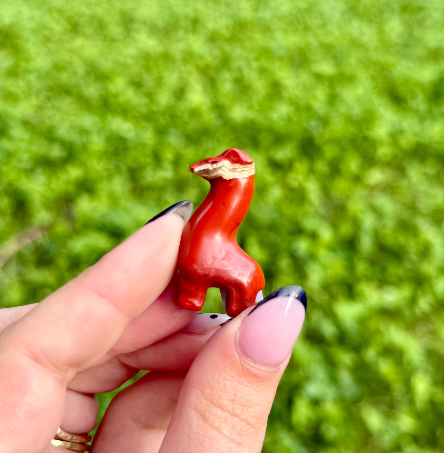Red jasper giraffe carving