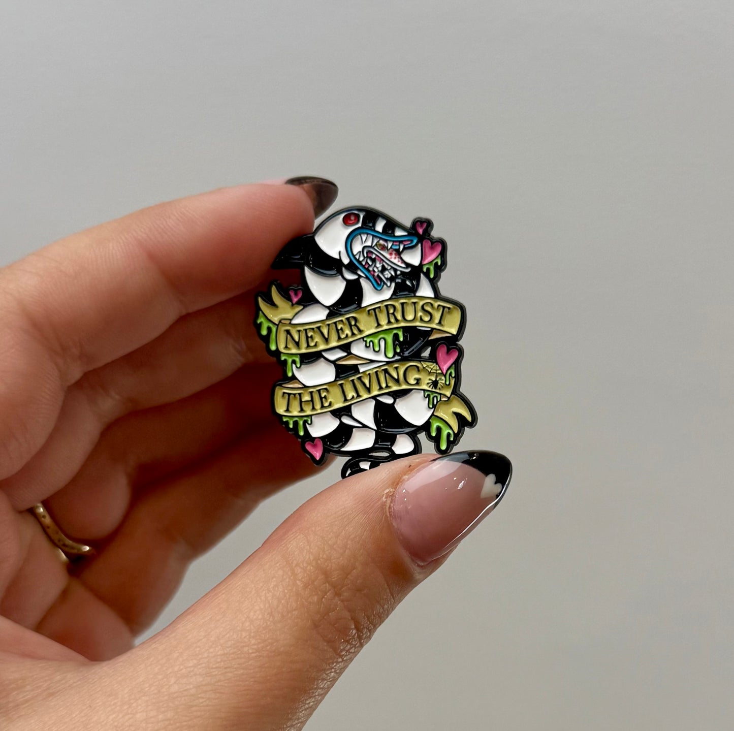 Beetlejuice never trust the living enamel pin