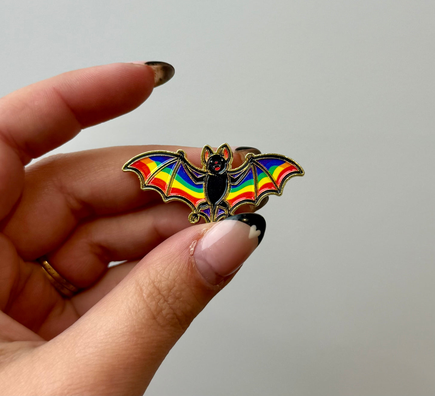 Rainbow bat enamel pin