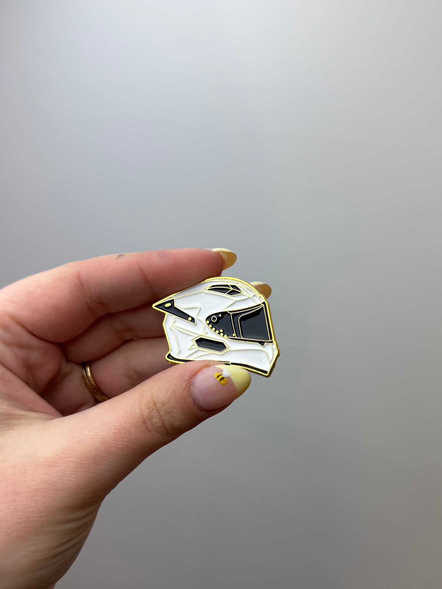 White motorcycle helmet enamel pin 