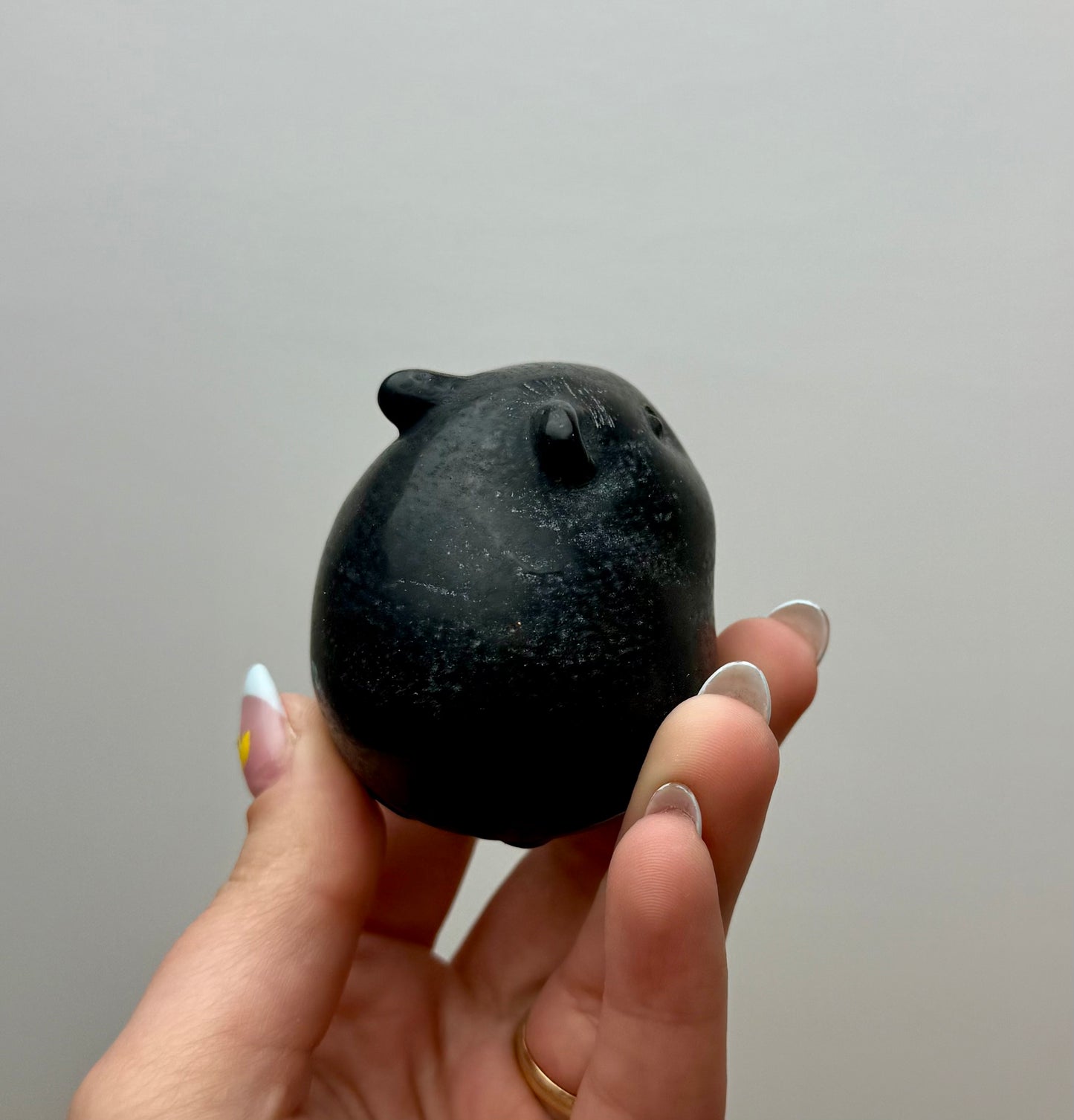 Obsidian hamster carving
