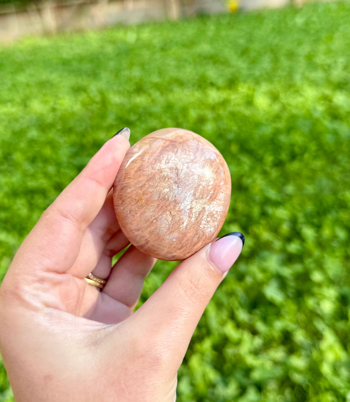 Peach moonstone palm stone