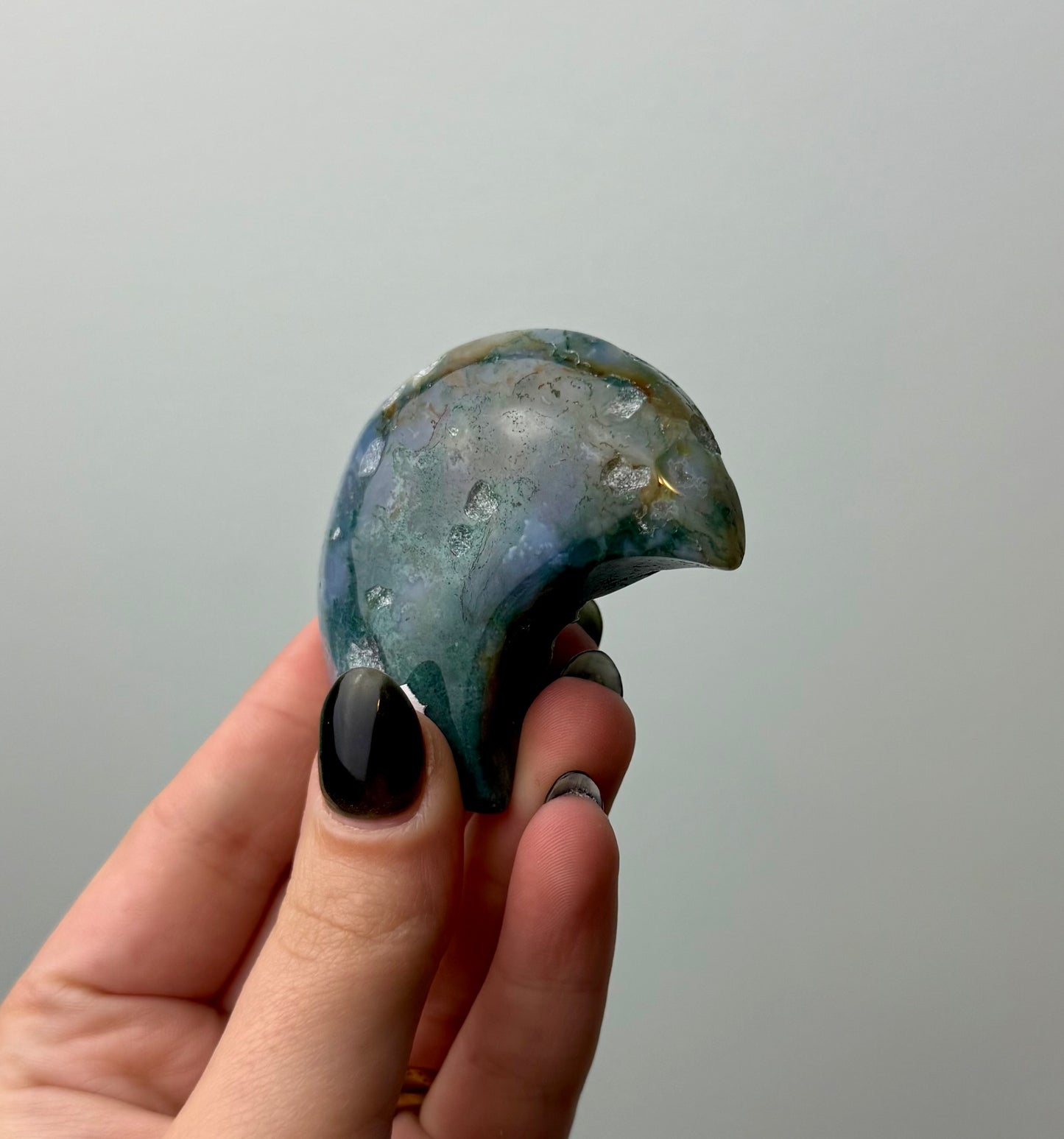 Moss agate moon carving