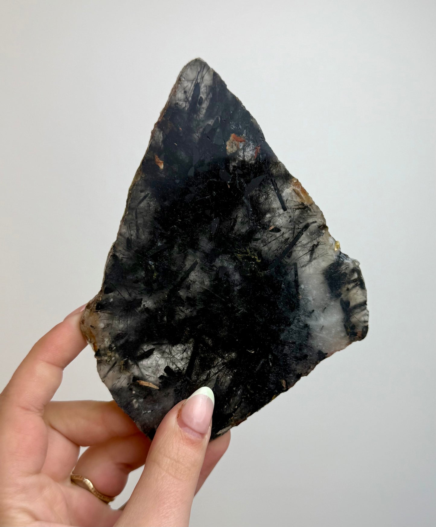 Black tourmaline in quartz slab