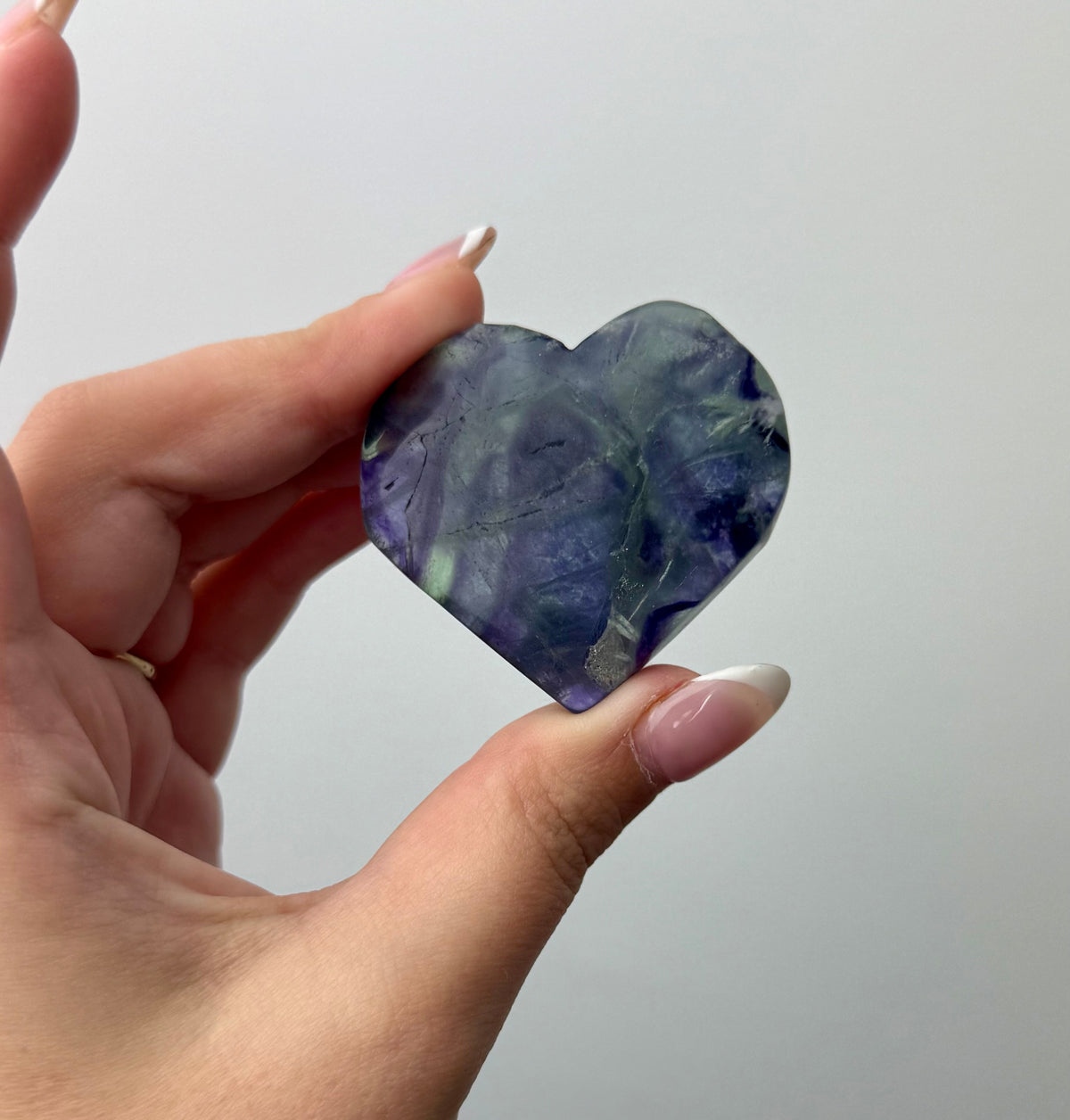 Feather fluorite heart carving