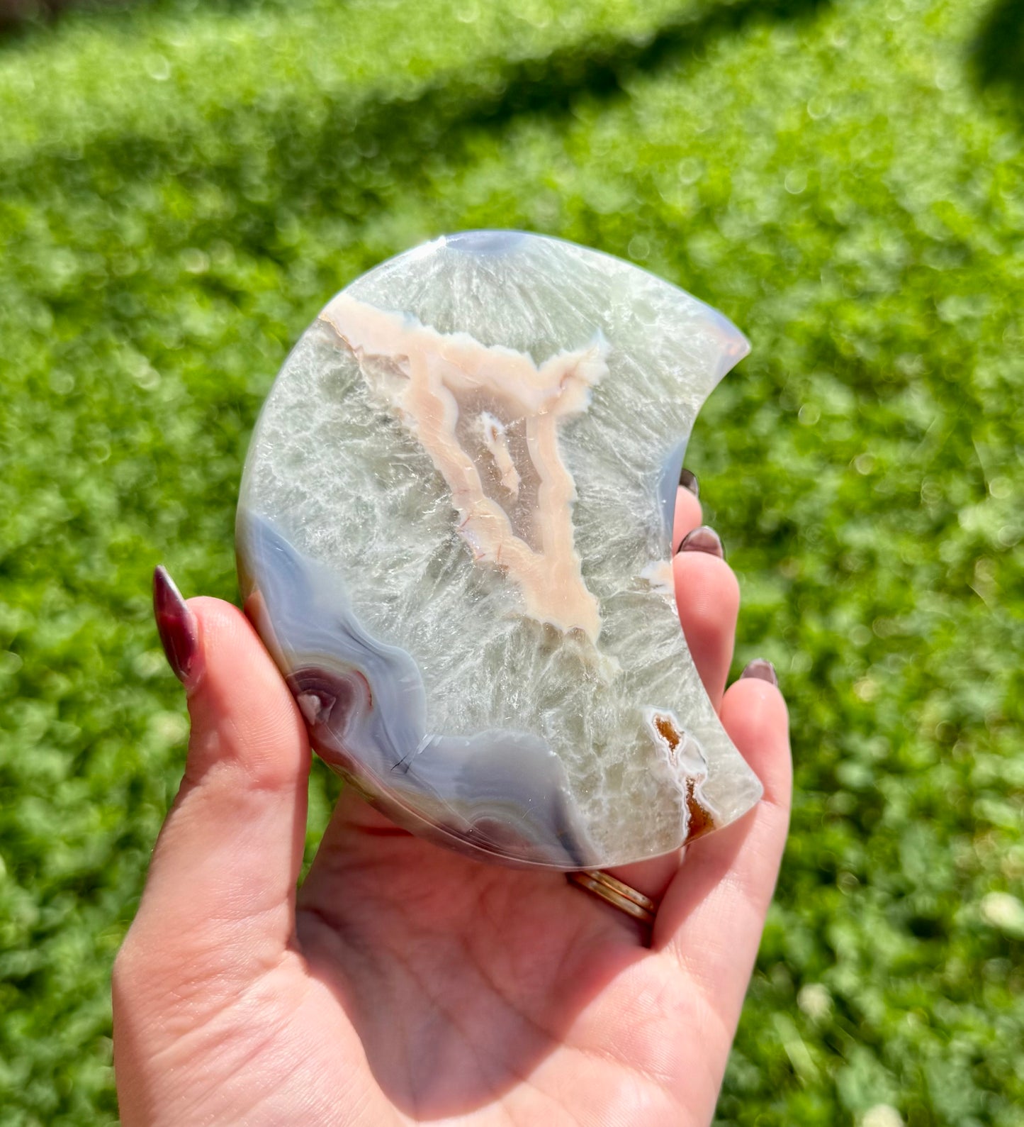 Dyed black flower agate moon carving